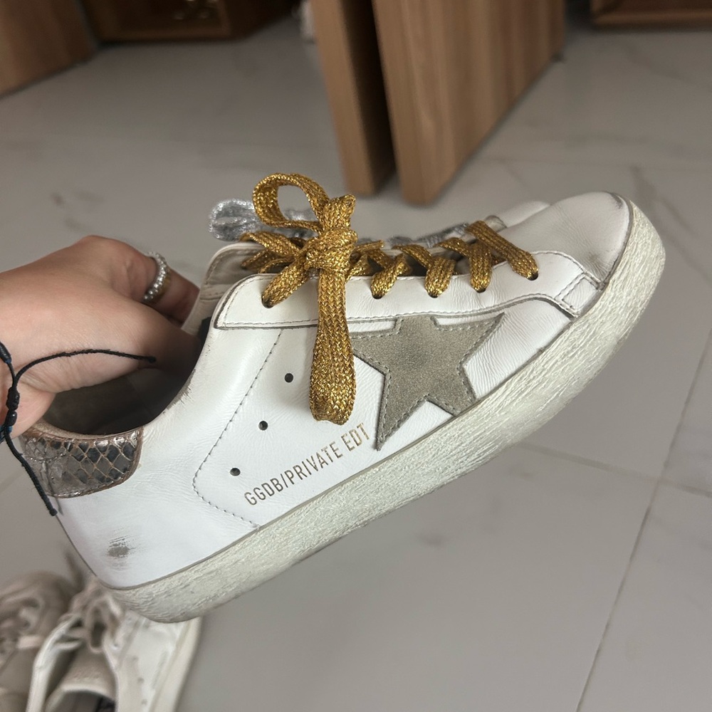 Golden Goose White Sneakers with Gold Laces and Silver Star